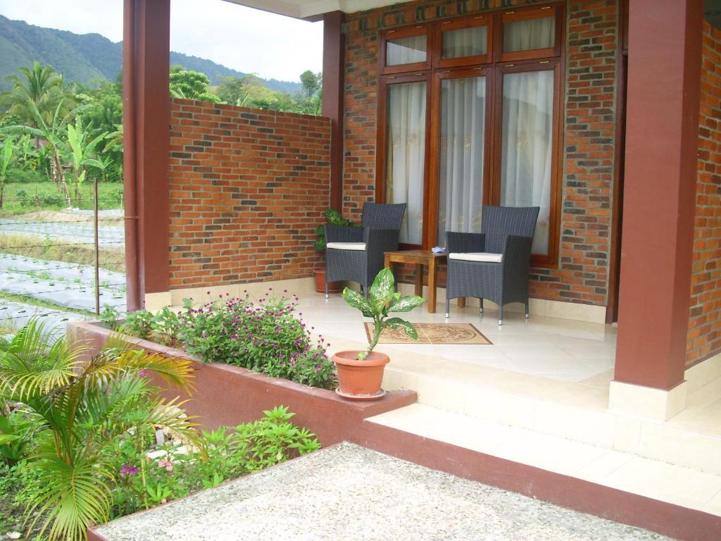 Toba Village Inn Tuk Tuk Szoba fotó